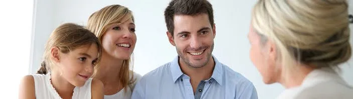 family talking to a lawyer